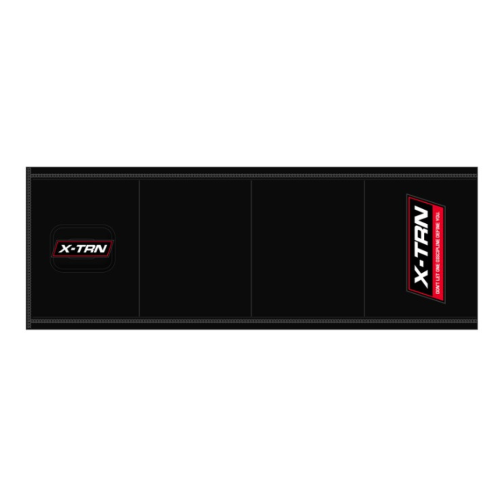 X-TRN arm band strap with logo and slogan showing branded fitness support gear for training and performance